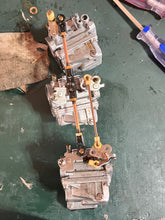 Load image into Gallery viewer, 40 hp Nissan Tohatsu CARBURETOR SET upper 3C8032002 3C8032001 center 3C8032070 3C8032072 bottom 3C8032100 3C8032102 Two Stroke 2002