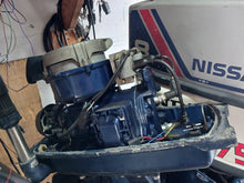 Load image into Gallery viewer, 8 hp Nissan two stroke 20 inch Tiller outboard 150 lbs compression on both cylinders
