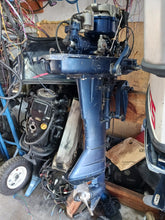 Load image into Gallery viewer, 8 hp Nissan two stroke 20 inch Tiller outboard 150 lbs compression on both cylinders
